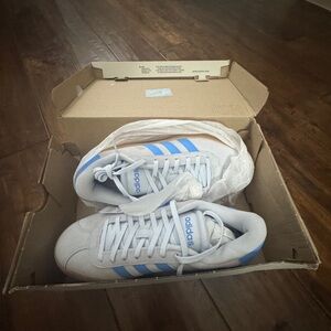 light blue and dark blue striped adidas